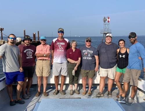 Alumni aboard the Badfish Chesapeake